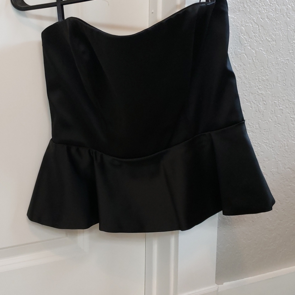 BEBE peplum strapless top